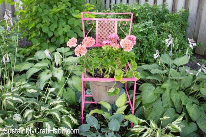 55. Paint old chairs to use as garden planters