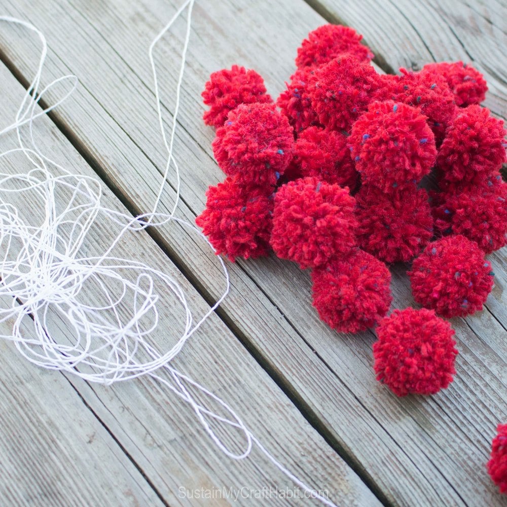 Red Yarn Pom Poms 