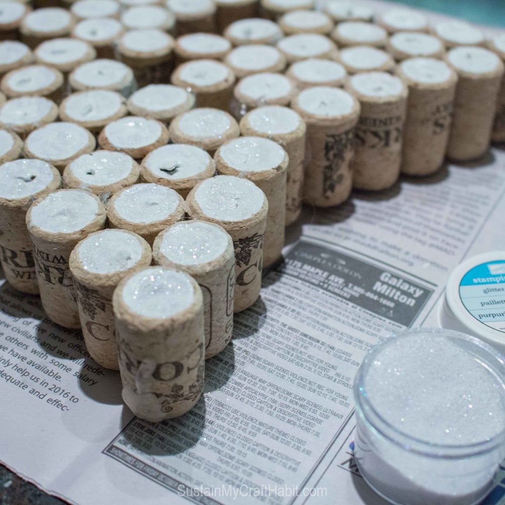 Up close image of detailed surface of wine corks after fine white glitter has been added on