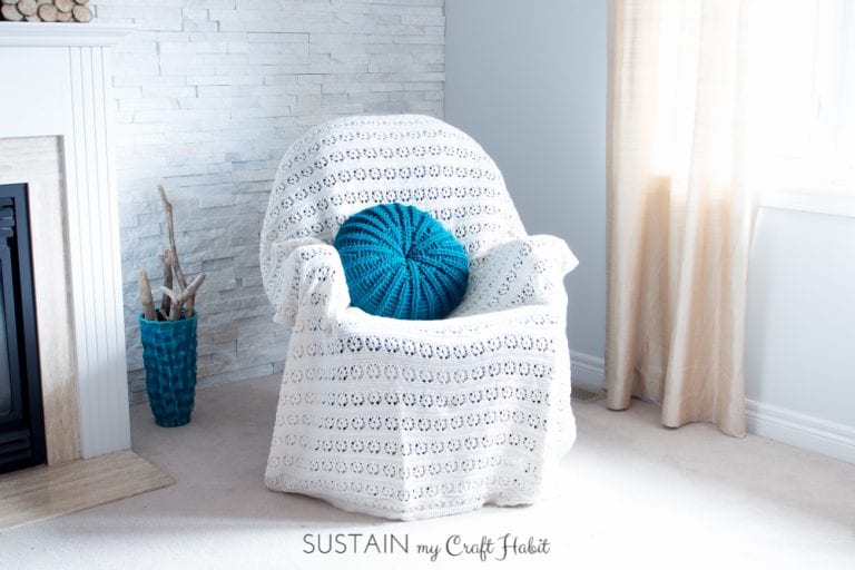 Pick up the free crochet pillow cover pattern for this coastal-inspired "Sand Dollar Throw Pillow", a perfect way to freshen up your spring-time living room decor.