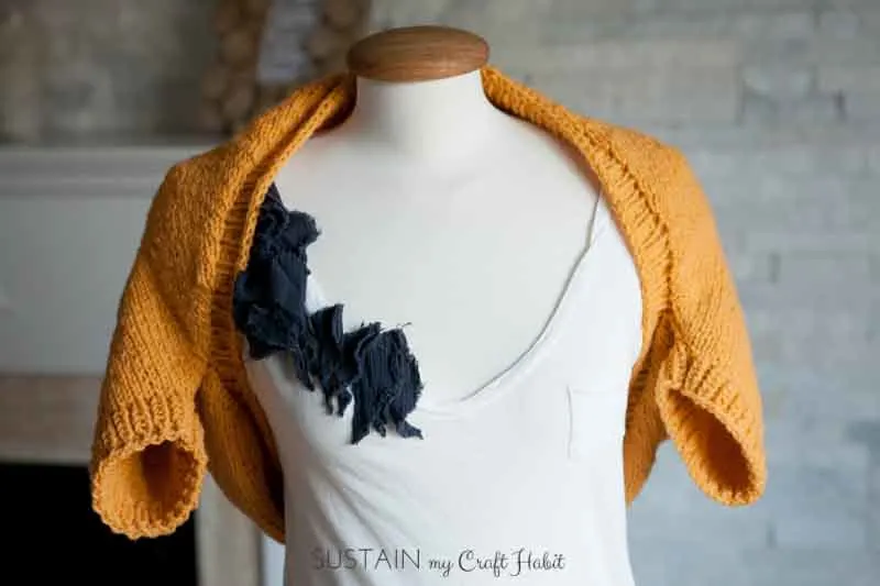 Beautiful and bright simple Sunrise Shrug free knitting pattern from SustainMyCraftHabit. This lightweight wool knit shrug is perfect for cool spring days and autumn nights.