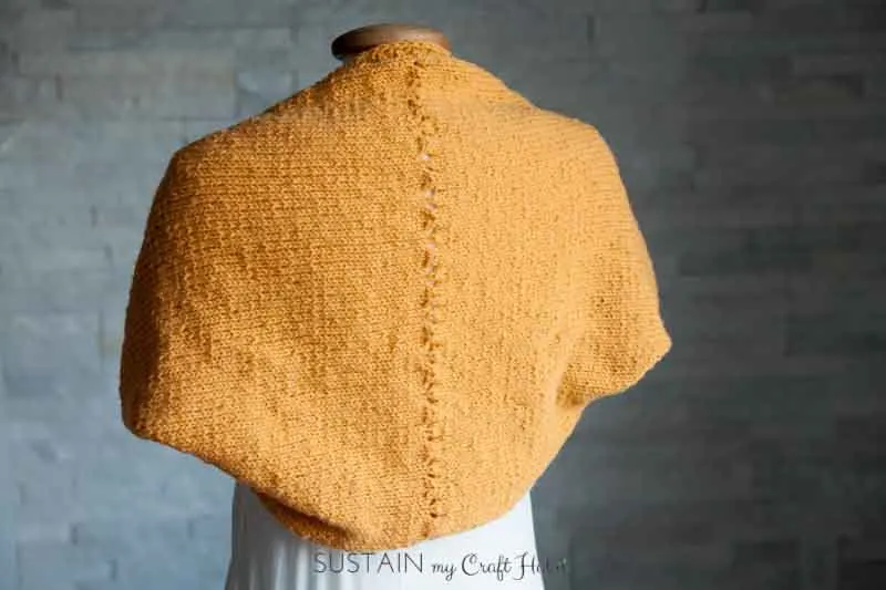 Beautiful and bright simple Sunrise Shrug free knitting pattern from SustainMyCraftHabit. This lightweight wool knit shrug is perfect for cool spring days and autumn nights.