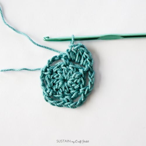 Starting the third round for a crochet coaster