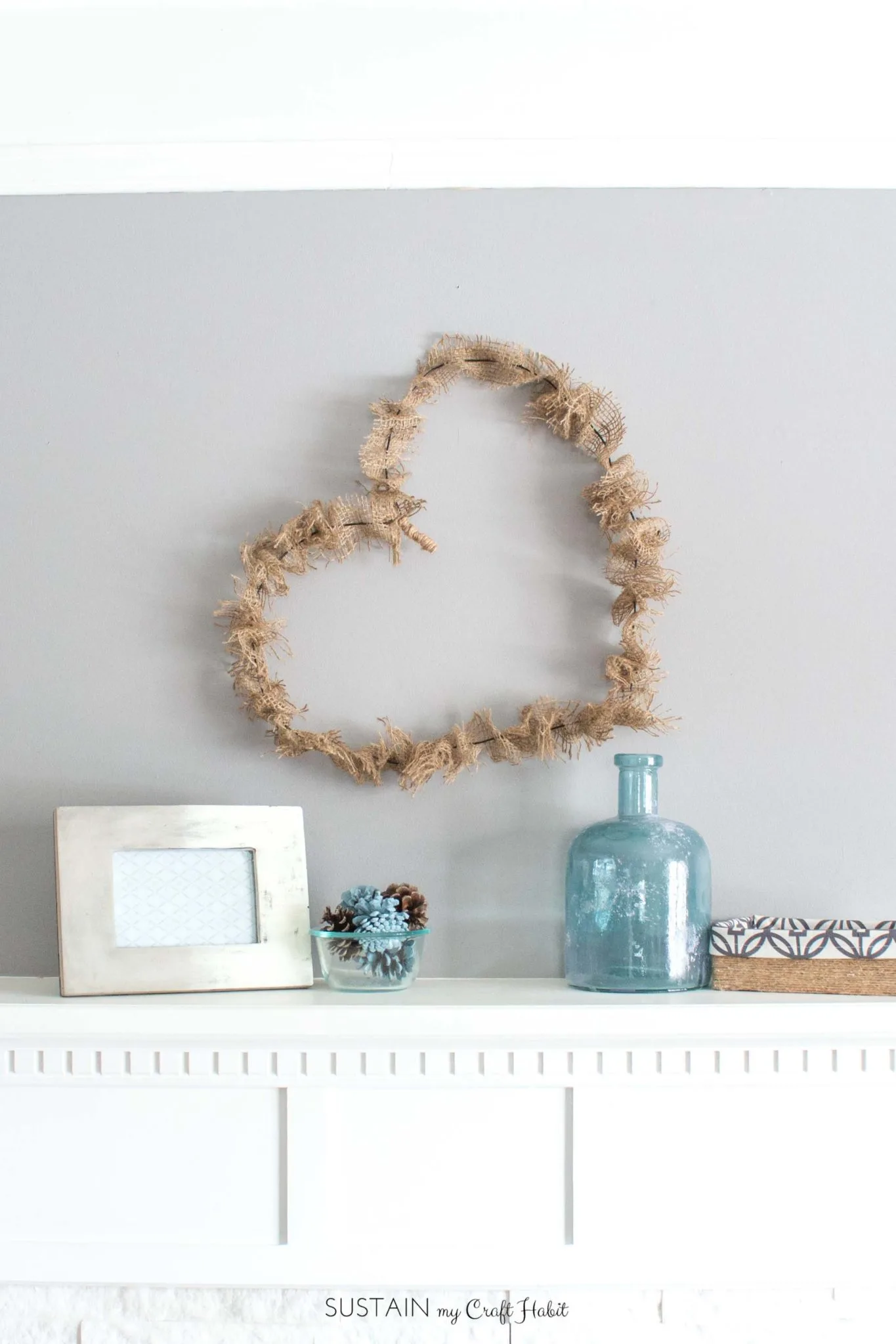 Simple heart-shaped rustic wreath with burlap.