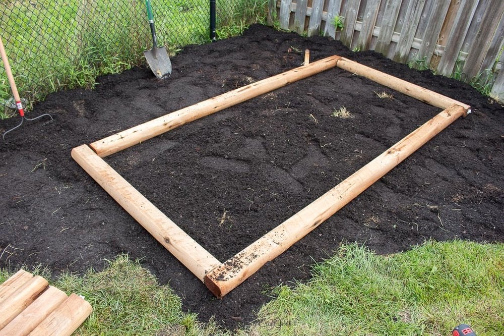 How to build a simple raised garden bed. Easy DIY project for making a vegetable or flower box in your backyard.