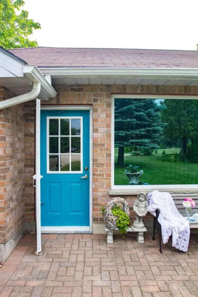 How to Paint a Front Door for added Curb Appeal! Gorgeous teal blue colored cottage front door. Simple refresh using DecoArt Americana Decor Curb Appeal in Harbor Blue.