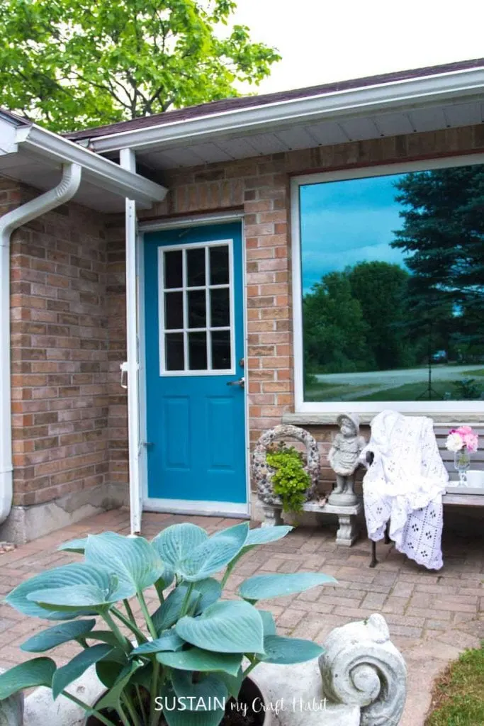 How to Paint a Front Door for added Curb Appeal! Gorgeous teal blue colored cottage front door. Simple refresh using DecoArt Americana Decor Curb Appeal in Harbor Blue.