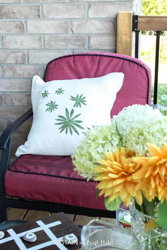 DIY throw pillow plus 11 other patio decorating ideas for a relaxing patio retreat.