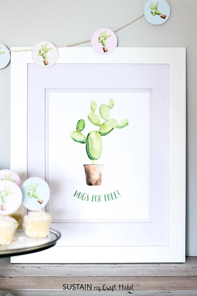 Adorable watercolor cactus wall art! Grab this free printable 