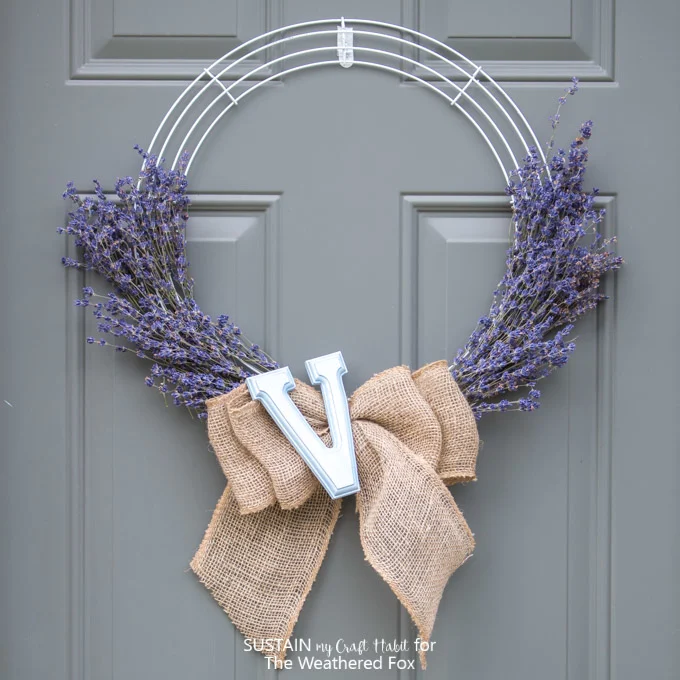 DY farmhouse inspired wreath made with lavender and burlap.