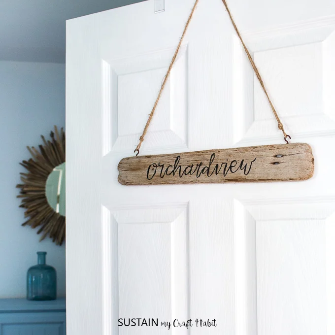 Add a little coastal personality to your cottage or home with this DIY driftwood sign. A little brush lettering cheat is included!