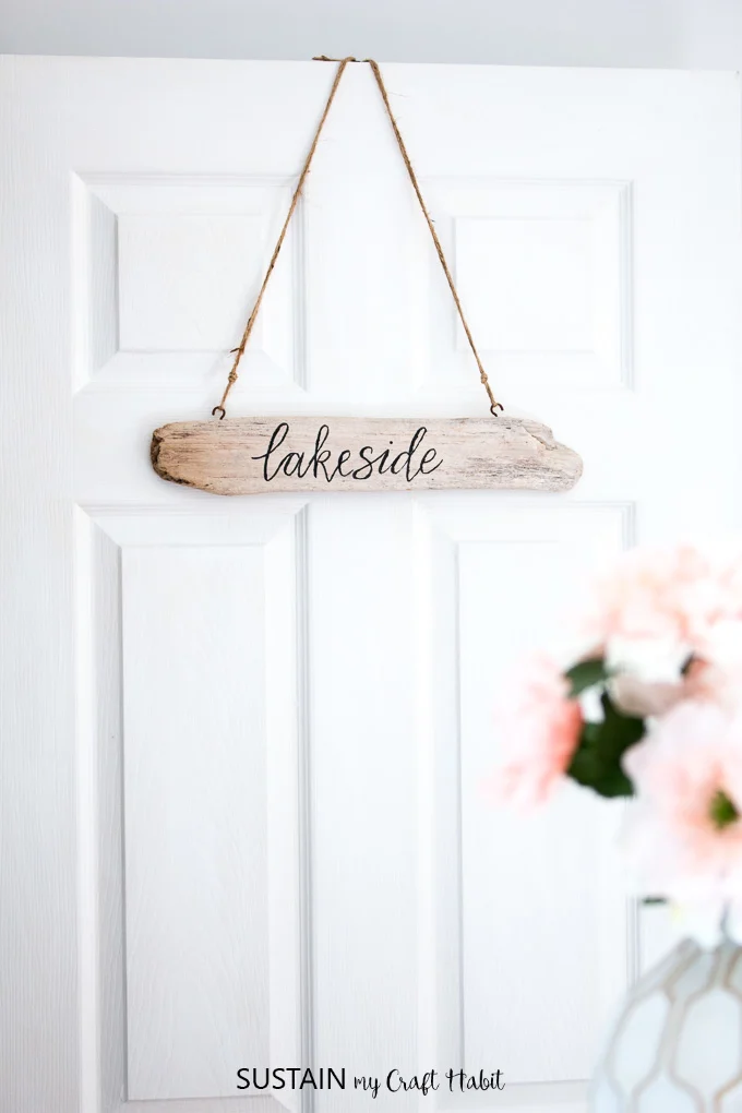 This hand-lettered DIY driftwood sign is a great way to add a little coastal personality to your cottage or home. A little brush lettering cheat is included!