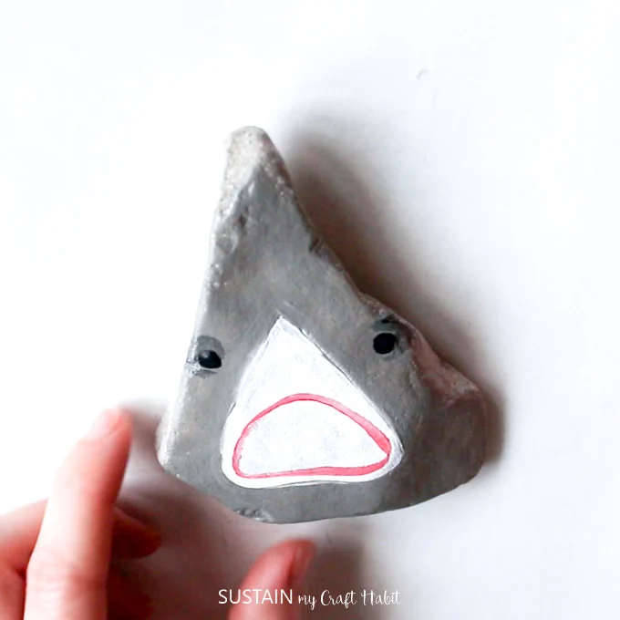 how to paint a shark head on a rock