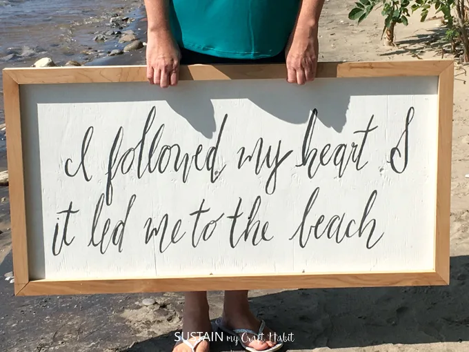 Make your own farmhouse sign with scrap wood pieces. Full tutorial for this beach-theme bedroom decor idea included!