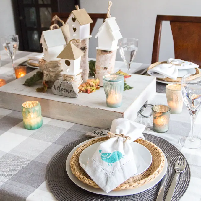 A rustic, woodland-inspired fall tablescape plus over a dozen more Thanksgiving tablescapes.