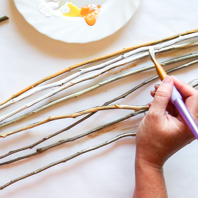 Painting twigs for wooden monogram letters