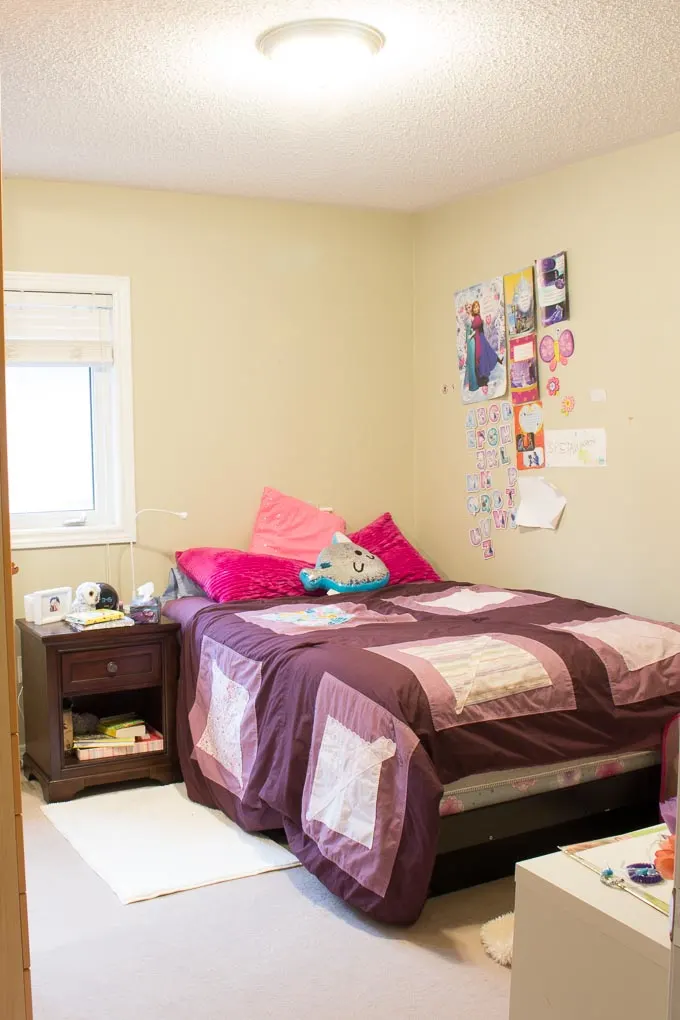 Girl's bedroom with beige wall prior to painting