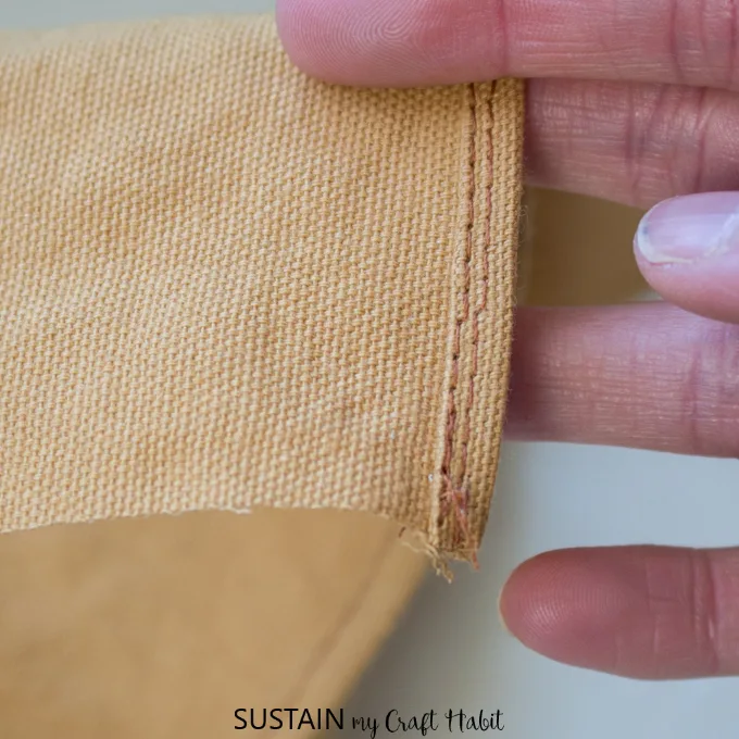 Showing a hem stitch on a DIY apron