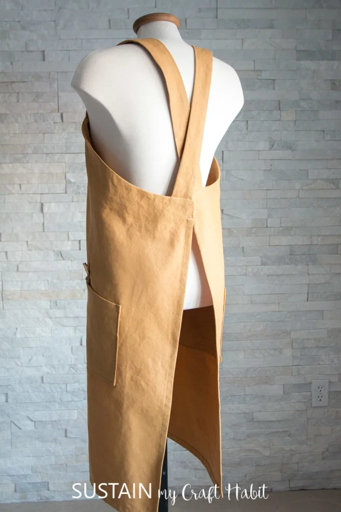 Back view of the criss-cross design of the DIY utility apron pattern