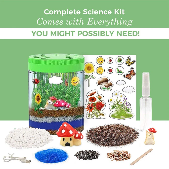 A light up terrarium and all of the pieces disassembled beside it to show what you get inside the kit.