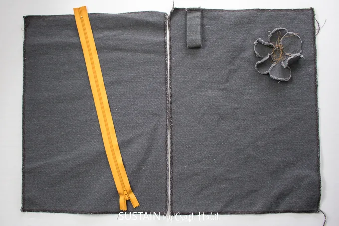 Image showing how to place the fabric pieces side-by-side to position the zipper prior to sewing.