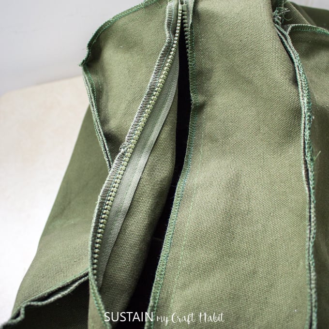 Adding the zipper onto the rucksack.