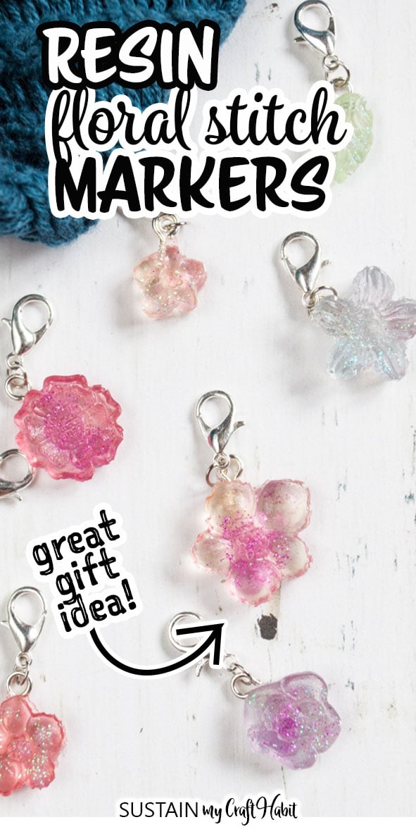 Completed DIY stitch markers on a white wood background with text overlay reading "Resin floral stitch markers"