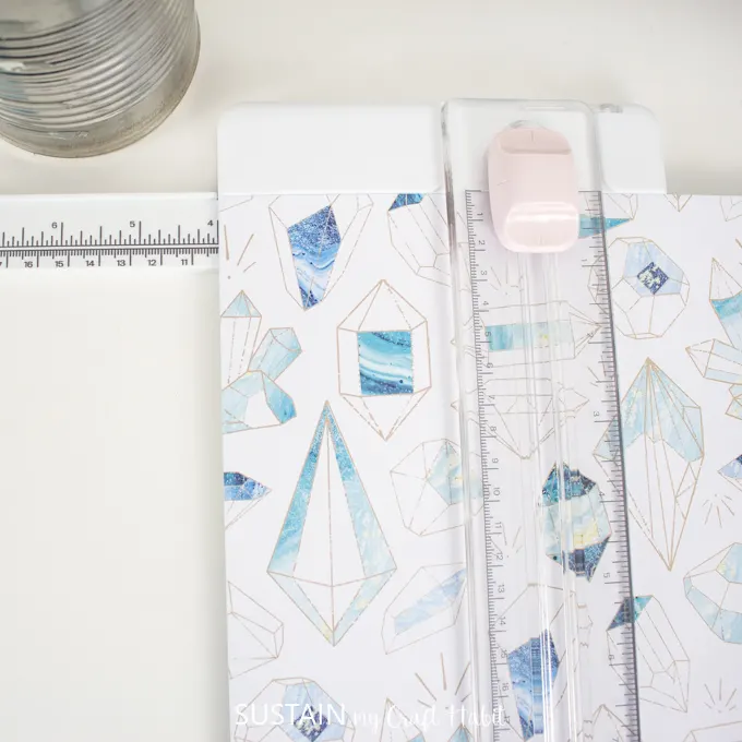 Cut Cricut's Deluxe Paper to size using a paper trimmer