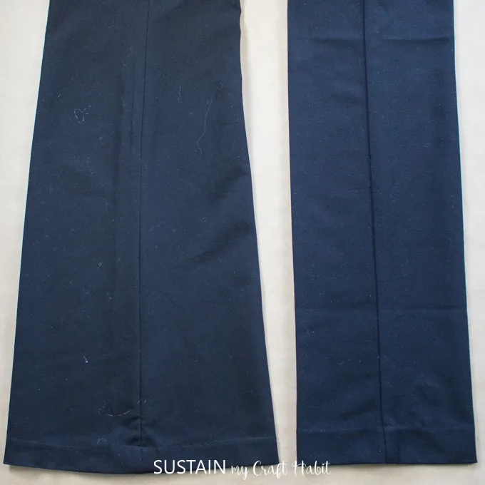 Two dark blue pant legs showing the dfference between a flared leg versus a straight leg style. 
