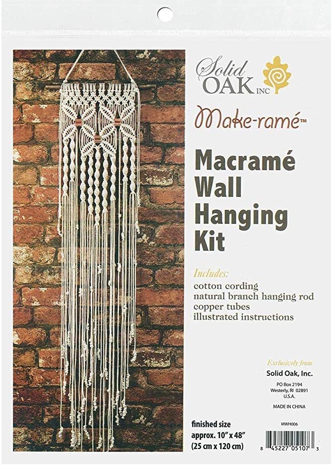 Package cover of a DIY macrame kit showing a completed wall hanging.