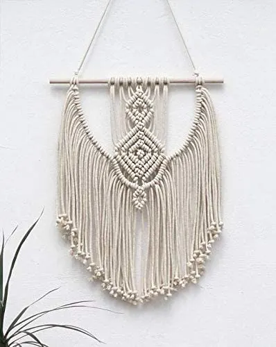 Completed macrame wall hanging.