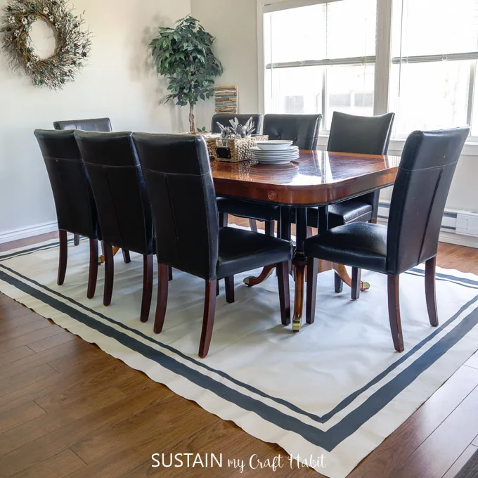 painted canvas DIY rug under dining table