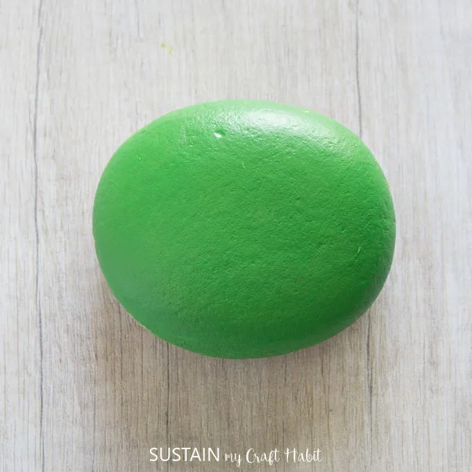 A green painted rock.