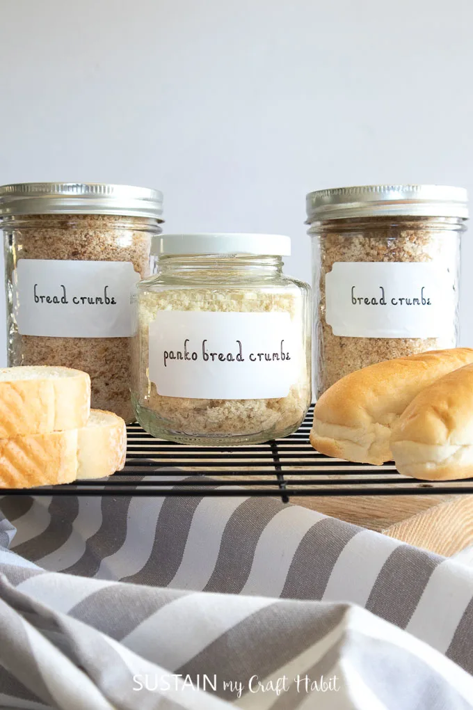 Three mason jars filled with bread crumbs and labelled with Cricut Joy Smart Label. The labels say "bread crumbs" and "panko bread crumbs."