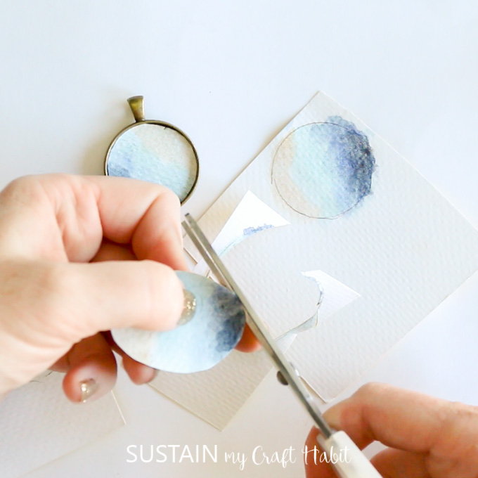 Cutting out the watercolor paintings