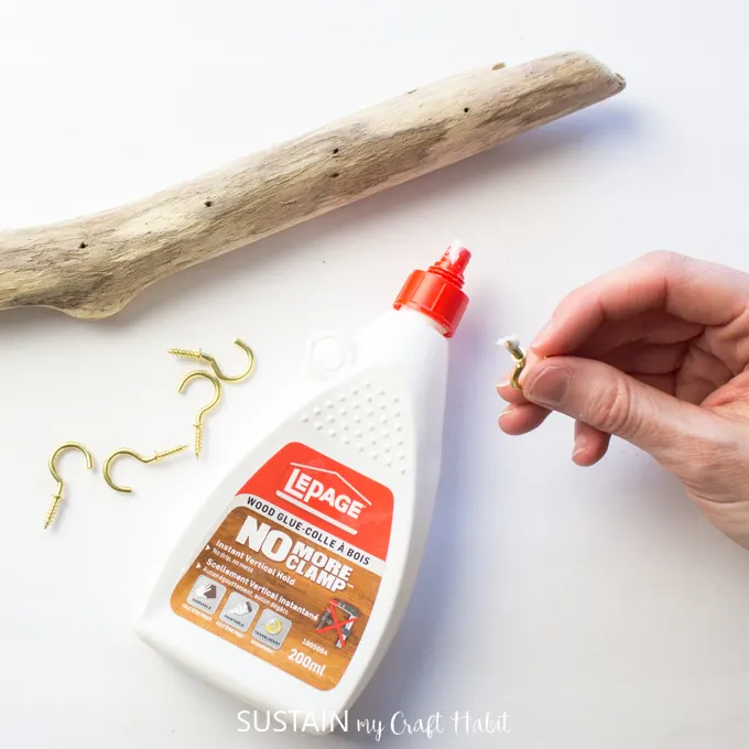 Adding wood glue to a gold hook