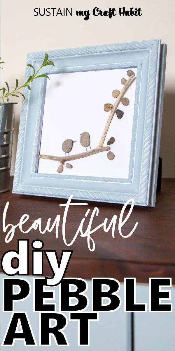 Framed pebble art resembling two birds perched on a tree branch with text overlay "beautiful diy pebble art."