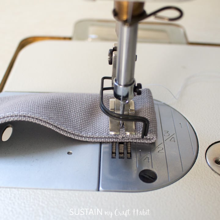 turn the strap ends under twice and topstitch in place