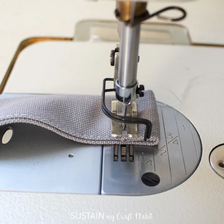 turn the strap ends under twice and topstitch in place