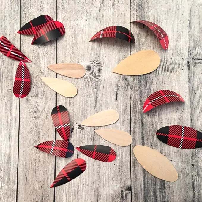 Teardrop wood slices and cut out gift wrap.