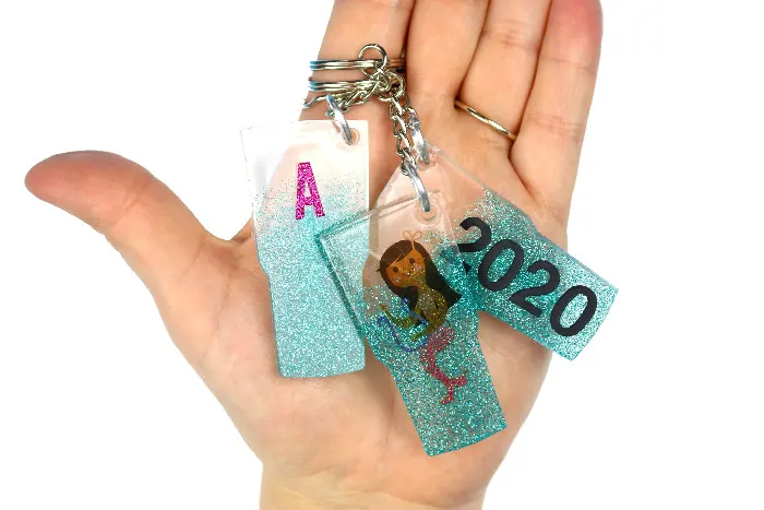 Resin crafts holding keychains.
