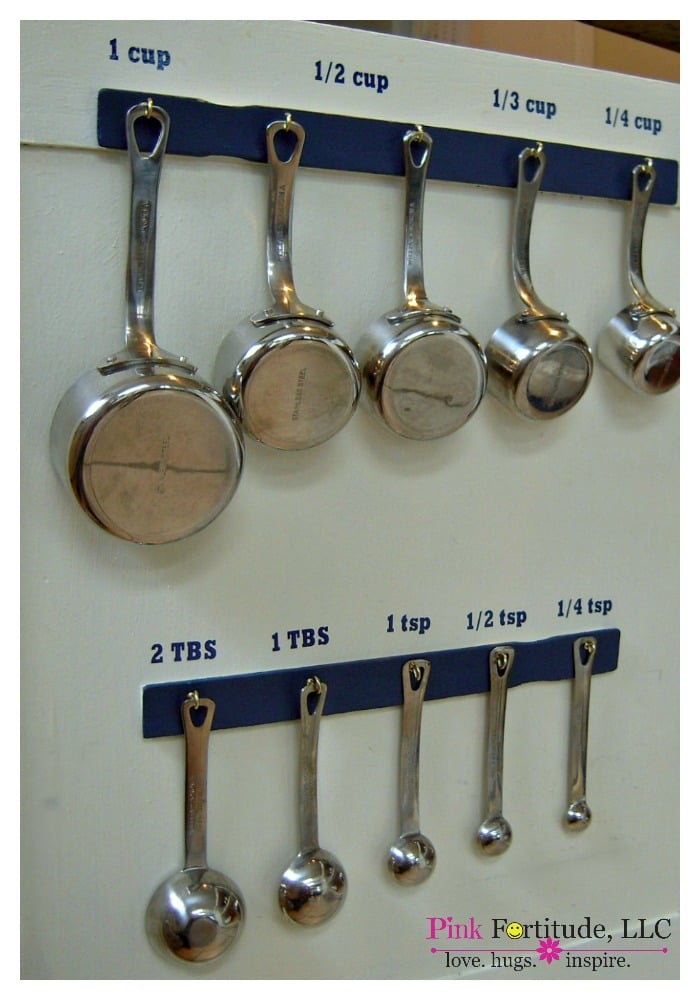 upcycled home organizing measuring cup holder.