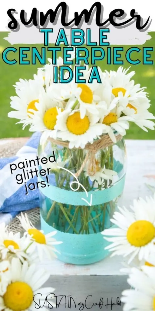 Mason jar summer table centerpiece with daisies and text overlay.