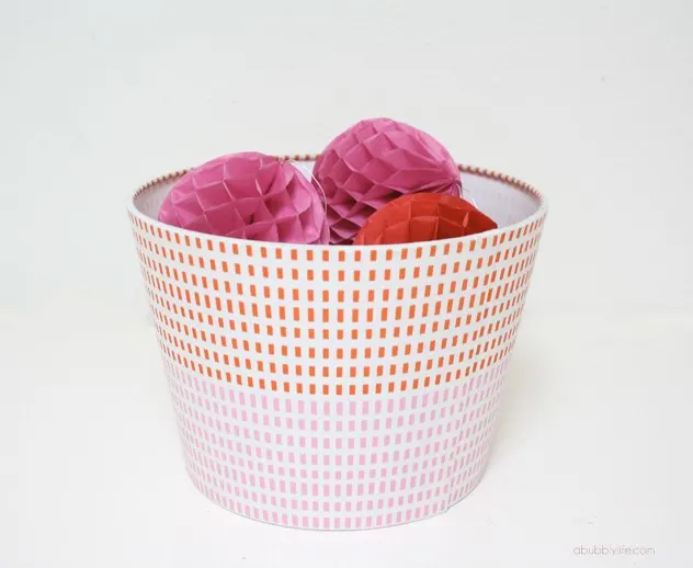 ikea hack ideas turning a lampshade into a storage bin.