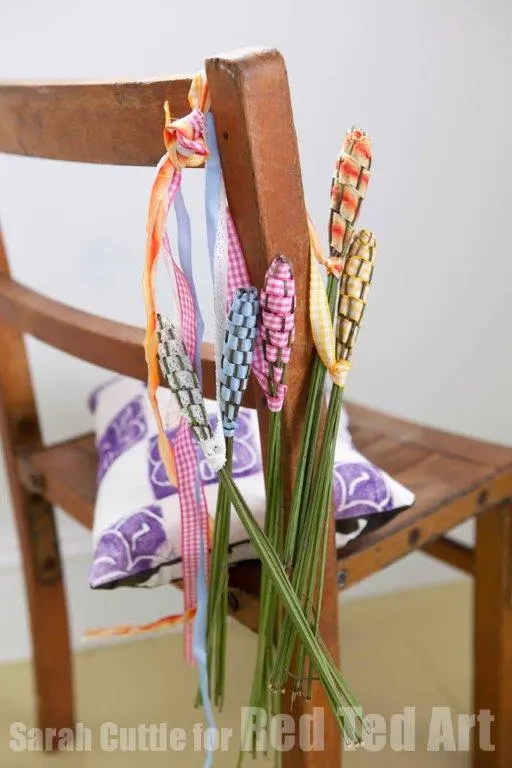 lavender craft wands on a wooden chair.