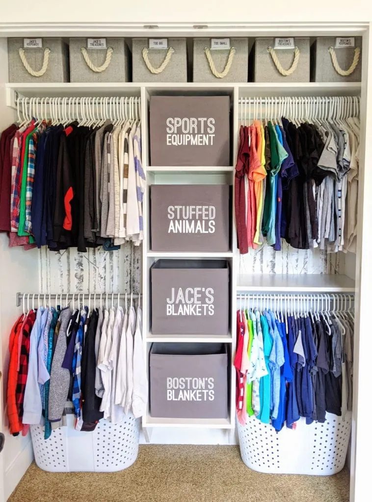 Ikea hack ideas turning grey bins into labelled organizers inside a closet.