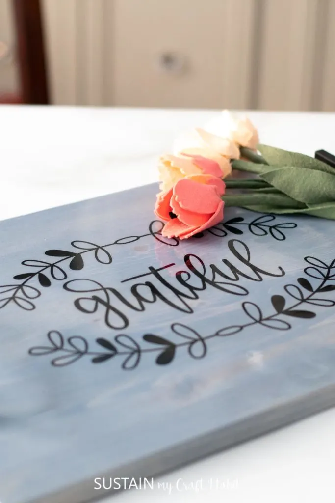 Finished farmhouse inspired wood serving tray with the words "grateful."