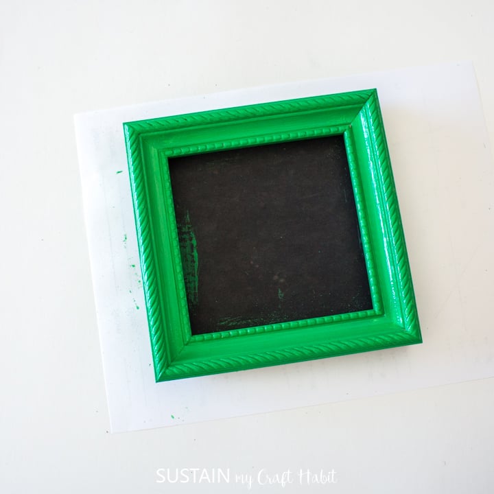 Green painted picture frame.