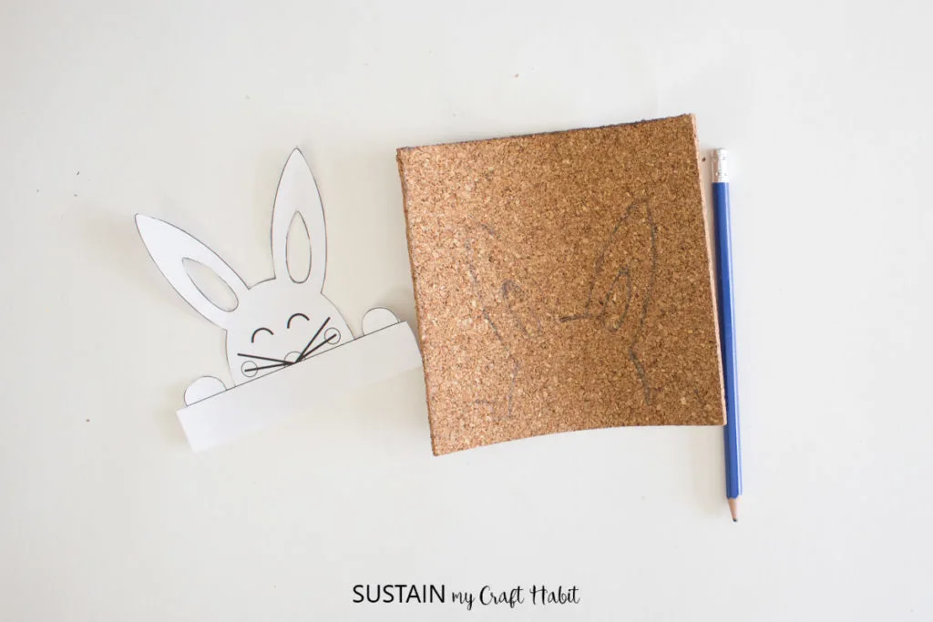 Traced Easter bunny onto the cork sheet.