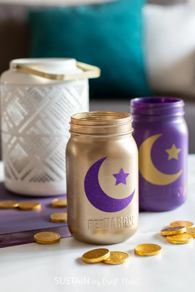Decorative Eid jars with scattered coins.